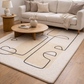 Living room with a beige sofa, wooden coffee table, and decorative rug.