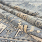 Close-up of patterned rugs with geometric designs.