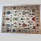 Decorative rug with intricate patterns on a white floor
