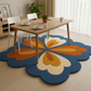 Dining room with a colorful floral rug on a wooden floor