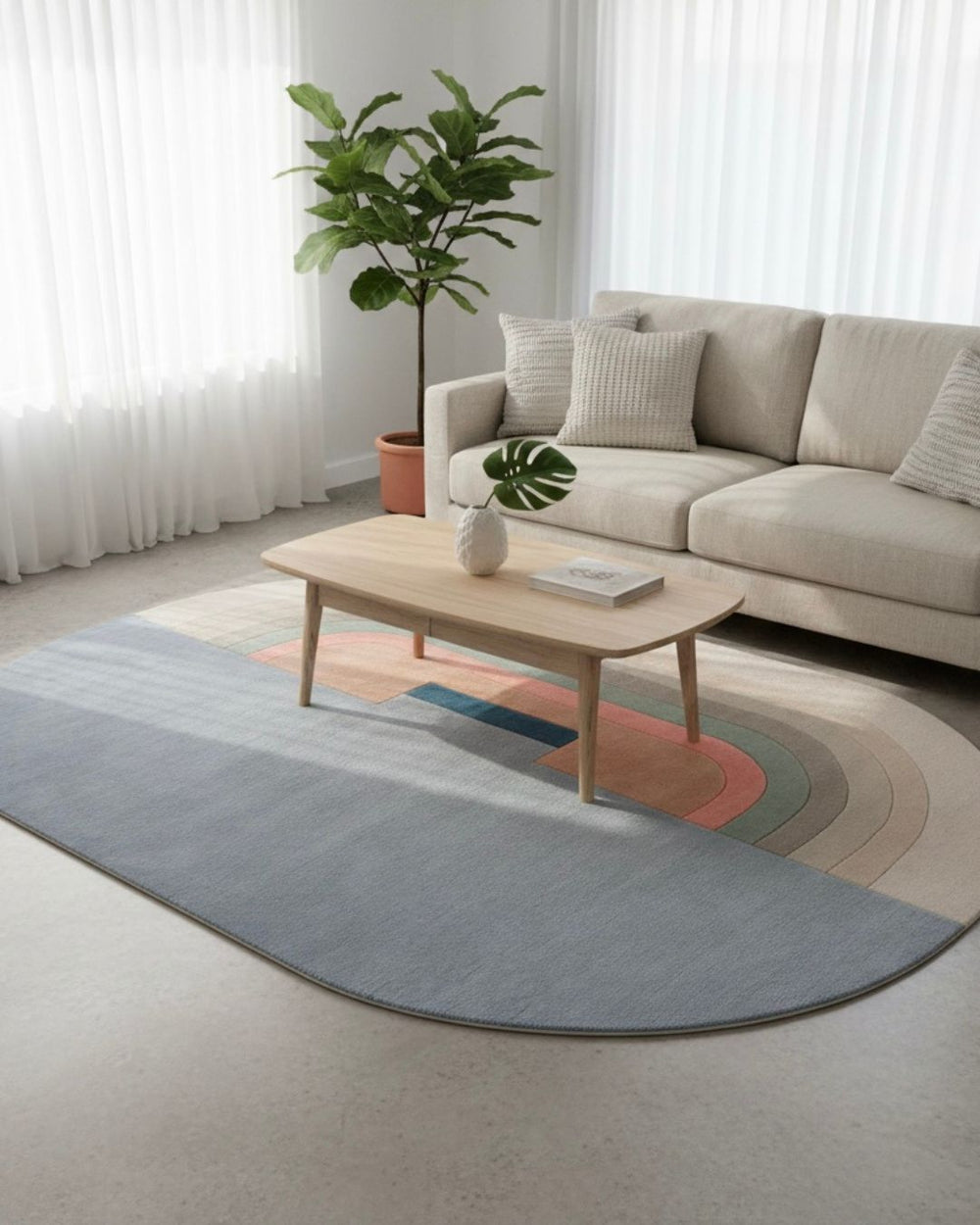 Living room with a sectional sofa, coffee table, and colorful rug.