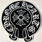 Circular logo with floral design and text on a white background