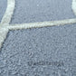 Soft and cozy rug with a pattern of textured arches