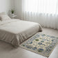 Bedroom with a decorative rug on the floor