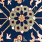Close-up of a detailed rug with geometric pattern
