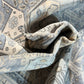 Close-up of textured fabric with intricate patterns on a matching background