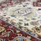Close-up of a patterned rug with intricate designs.