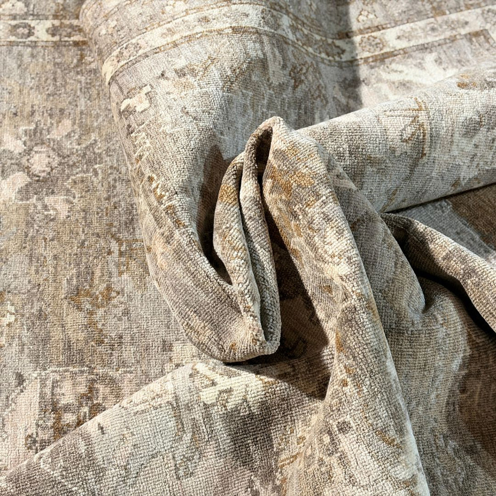 Close-up of textured fabric with a neutral color palette