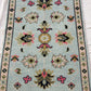 Decorative rug with floral patterns on a light blue background
