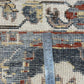 Rug with a pattern and a ruler for scale