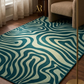 Teal and white wavy patterned rug on a wooden floor with a chair and window in the background.