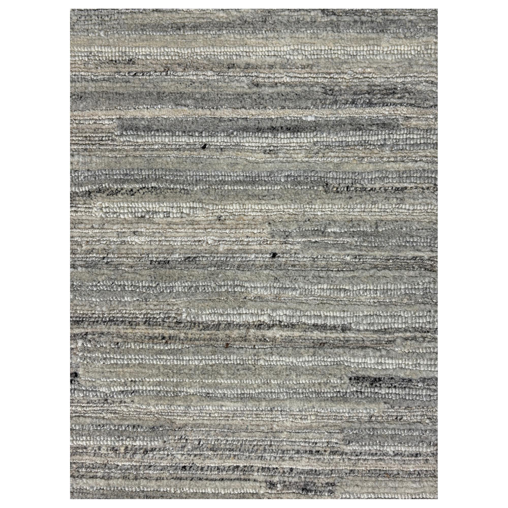 Textured gray area rug on a white background