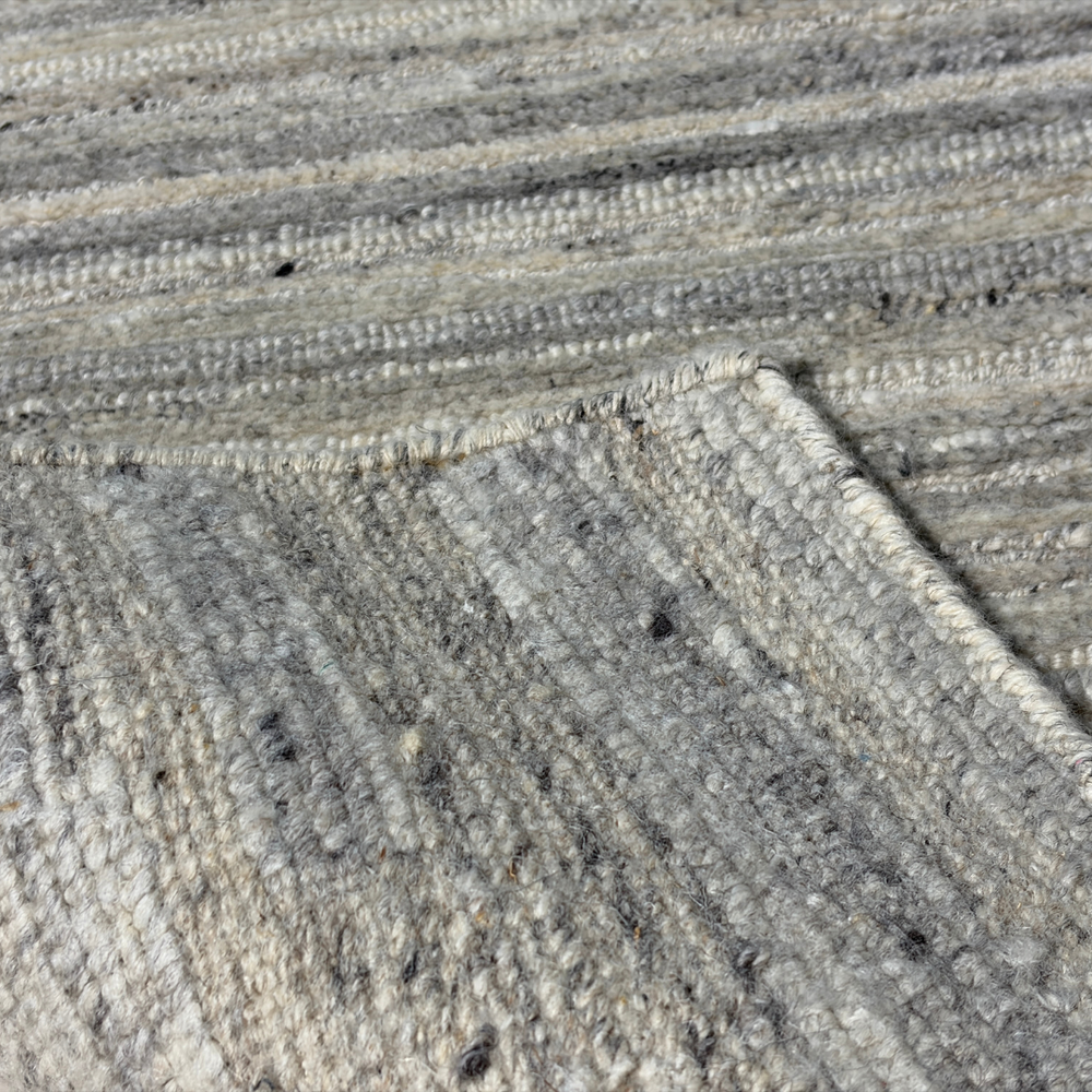 Close-up of textured concrete surface with visible cracks and patterns