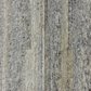 Close-up of textured gray carpet with a subtle pattern