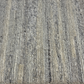 Close-up of textured gray carpet