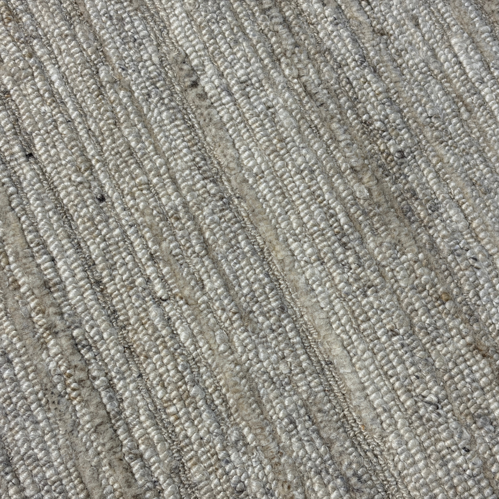 Close-up of textured gray carpet