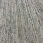Close-up of textured gray carpet