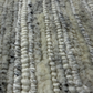 Close-up of textured gray and white carpet
