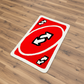 Card with directional arrows on a wooden floor