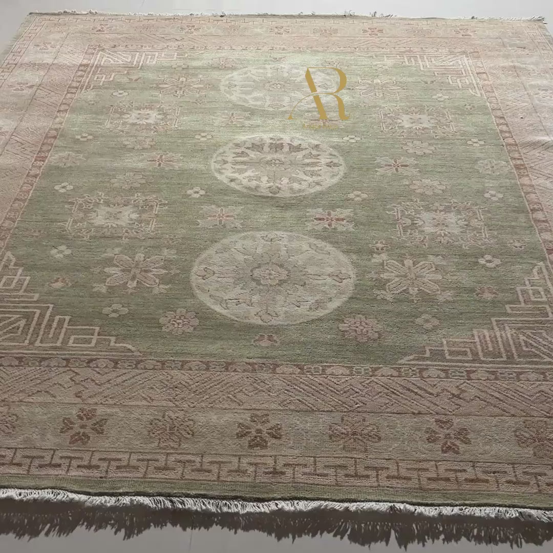 Close-up of two patterned rugs with geometric and floral designs.