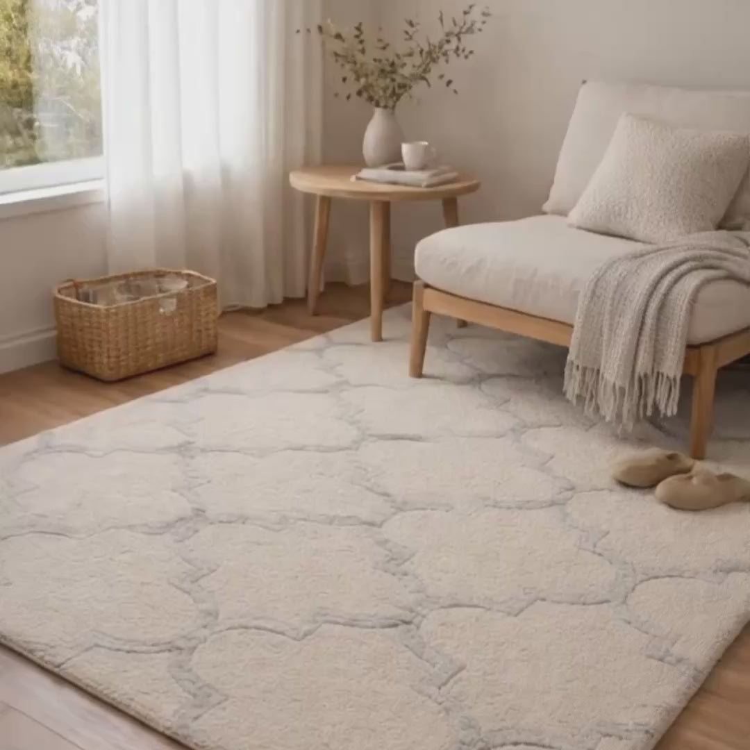 Beige patterned rug on a wooden floor