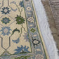 Bedroom with a decorative rug on the floor