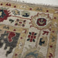 Close-up of a patterned rug with a visible textures.